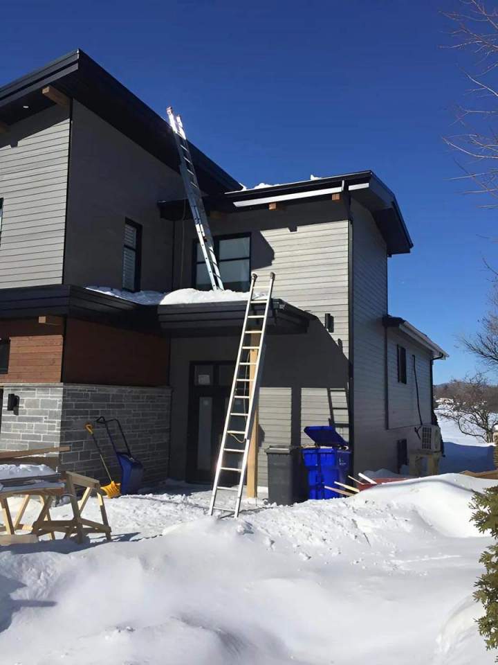 Pose de gouttières Québec